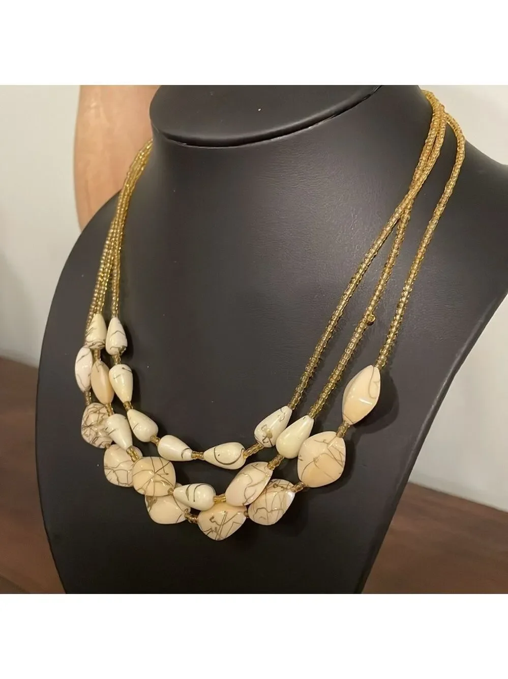 Vintage triple strand gold seed bead and ivory swirl beaded necklace